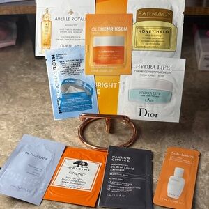 Assorted Women's Skincare Sample Pack – Mixed Brands (Orange, White, Black)